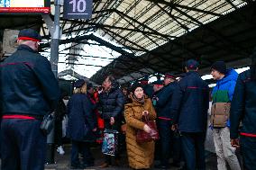 Controllers Check Passengers Exiting Trains - Paris