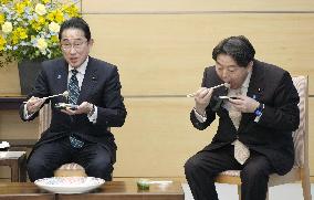 Japan PM Kishida tastes tiger puffer fish