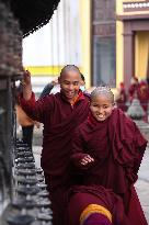 Monks At Swayabhunath Stupa In Kathmandu, Nepal.