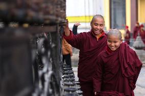 Monks At Swayabhunath Stupa In Kathmandu, Nepal.