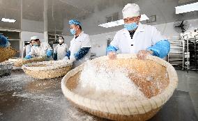 Workers Make Glutinous Rice Balls