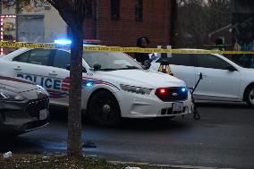 Daytime Evidence Search At Fatal Shooting Investigation Scene In Washington DC