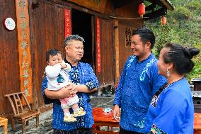 Feature: Cadres at your service: Chinese way to inspirit villagers out of poverty