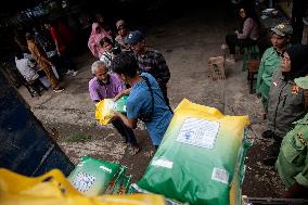 People Queue For Cheap Rice In West Java