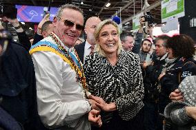 Marine Le Pen Visits The Agricultural Fair - Paris