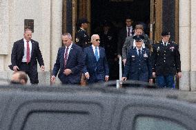 President Joe Biden departs from his physical