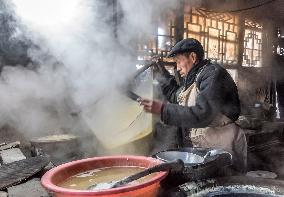 Craftsman make tofu in traditional ways in Hebei,China
