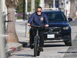 Arnold Schwarzenegger Out For A Bike Ride - LA