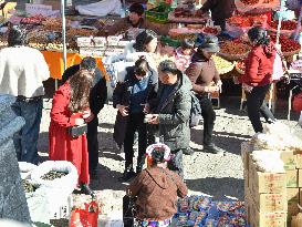 Tourists Visit Sanyue Street in Dali