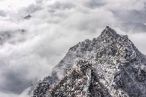 Get a grand view of a sea of clouds when climb to the top of the China's Jiankou Great Wall
