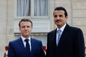 Qatar's Emir Sheikh Tamim Bin Hamad Al-Thani And French President Emmanuel