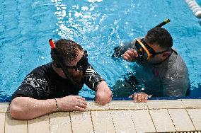 Croatian military teach Ukrainian veterans how to dive in Lviv