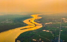 Winding River At Sunset in Suqian