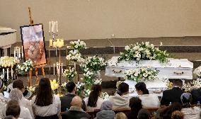 Memorial service for mother and 4mo baby killed in March 2 Russian drone attack on Odesa