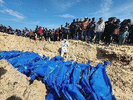 Palestinians Bury Dozens in a Mass Grave - Rafah