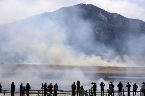 Controlled grassland burning at Mt. Aso