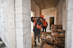 Residential building destroyed by Russian shelling undergoes restoration in Zaporizhzhia