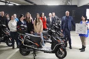 Handover ceremony of scooters to Ukraine