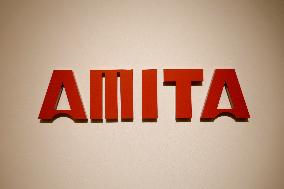 Amita Holdings signage and logo