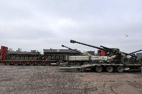 Volunteers hand over mobile baths and restored trophy vehicles to military in Odesa