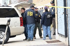 FBI Agents Collect Evidence Following Double Murder At Warehouse In Mount Vernon New York