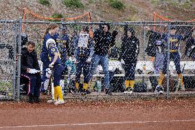 Members Of Nevada Union And Bear River High Schools Play Softball During Storms In Grass Valley, Calif., On Friday, March 22, 20