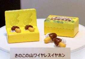 Translator earphones in shape of Japanese popular snack