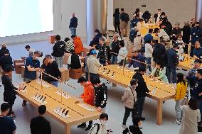 Customers Shopping at Asia Largest Apple Store in Shanghai