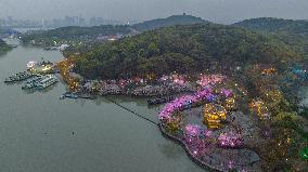 Tourists Enjoy Cherry Blossoms at Yuantouzhu Scenic Area in Wuxi