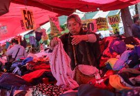 Selling Used Clothing In Outdoor Markets