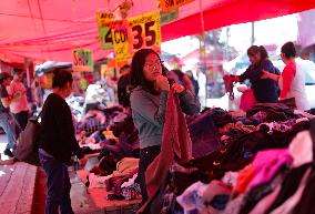 Selling Used Clothing In Outdoor Markets