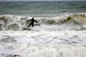 Surfing during storm in Odesa