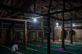Ancient Wooden Mosque In Indonesia
