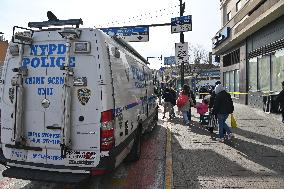 Crime Scene Investigators At Scene Of Two Year Old Boy Shot In Bronx New York