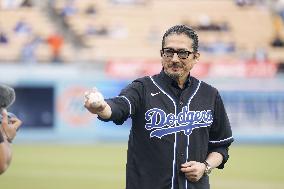 Japan actor Sanada tosses pitch at Dodger Stadium