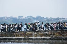 Tourists Visit The West Lake in Hangzhou
