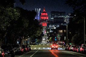 City Hall Is Illuminated In Red For World TB Day In San Francisco, Calif., On Sunday, March 24, 2024.