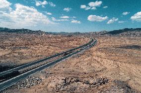 Beijing-Urumqi Expressway Crossing The Gobi Desert in Hami