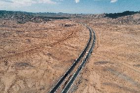 Beijing-Urumqi Expressway Crossing The Gobi Desert in Hami
