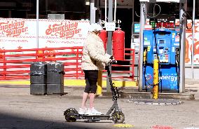 Deborra-Lee Furness Riding Her Scooter - NYC