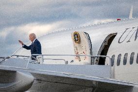 U.S. President Joe Biden boards Air Force One on his way to Dover