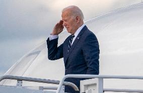 U.S. President Joe Biden boards Air Force One on his way to Dover