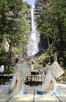 Ritual at waterfall in western Japan