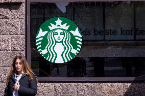 Starbucks American Coffee Chain Cafe In Amsterdam
