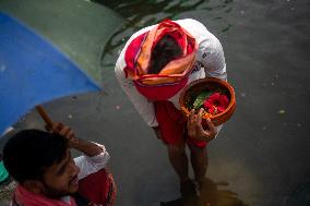 Hindu Pilgrims Take Holy Bath At Langalbandh