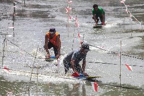 Traditional Mud Surfing Competition In Indonesia