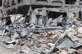 Residential buildings destroyed during Israeli raid in Nuseirat - Gaza