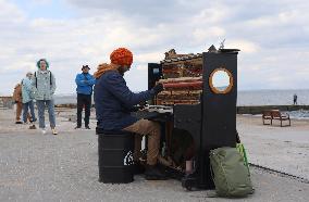 Street musician Ihor Yanchuk gives concert on Odesa beach