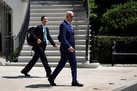Joe Biden Walks on the South Lawn of the White House