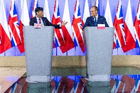 Poland's Prime Minister Donald Tusk Hosts UK Prime Minister Rishi Sunak